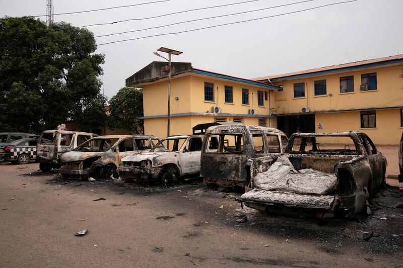 Burnt vehicles are seen outside the Nigeria police force Imo state command headquarters after gunmen attacked and set properties ablaze in Imo State, Nigeria. Reuters
