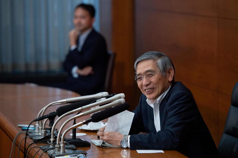 Bank of Japan's governor Haruhiko Kuroda speaks during a press conference about the monetary policy, at the Bank of Japan headquarters in Tokyo on June 15, 2018. Kuroda defended a decision to continue the country's ultra-loose monetary policy on June 15, even as the US Federal Reserve and European Central Bank tighten their policies. / AFP / Martin BUREAU

