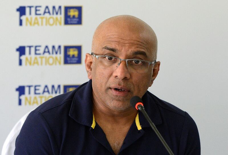 Sri Lanka's head cricket coach Chandika Hathurusingha takes part in a press conference in Colombo on July 8, 2019.  Hathurusingha insisted on July 8 he would remain Sri Lanka's cricket coach despite pressure to step down after their World Cup exit. / AFP / ISHARA S. KODIKARA
