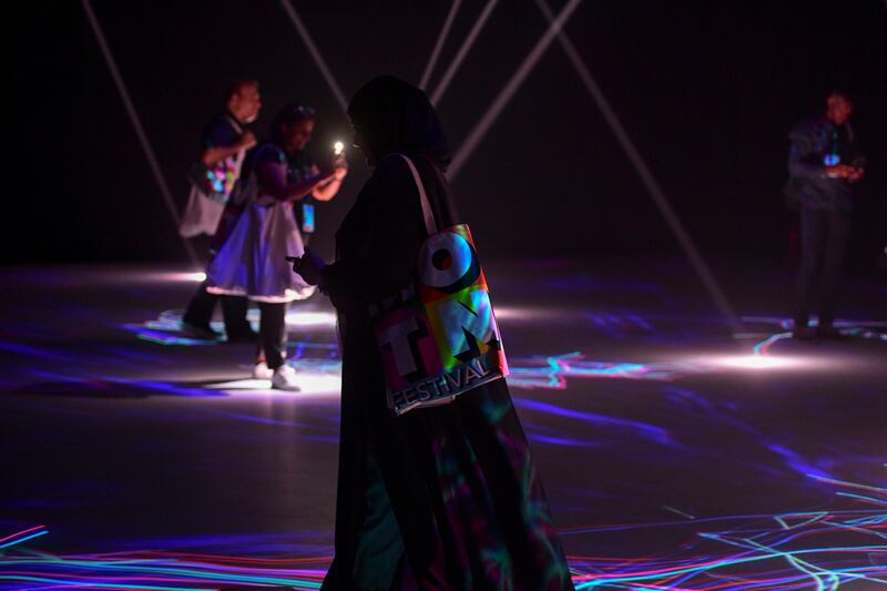 Visitors engage with Anima on the Corniche in Abu Dhabi