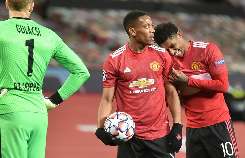Marcus Rashford (R) and Anthony Martial  before Martial took the penalty. EPA
