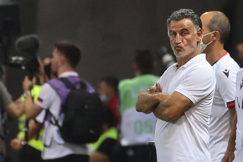 Nice's French coach Christophe Galtier looks over as he waits for the restart. AFP