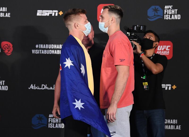 ABU DHABI, UNITED ARAB EMIRATES - OCTOBER 16: (L-R) Opponents Jimmy Crute of Australia and Modestas Bukauskas of Lithuania face off during the UFC Fight Night weigh-in on October 16, 2020 on UFC Fight Island, Abu Dhabi, United Arab Emirates. (Photo by Josh Hedges/Zuffa LLC)