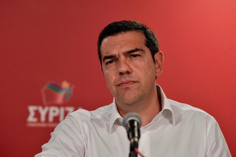 Greek Prime Minister Alexis Tsipras delivers a speech after the European parliamentary elections in Athens, on May 26, 2019. Greek Prime Minister Alexis Tsipras said on May 26, 2019 he would call for early polls next month after a drubbing at European and local elections. "Following the second round of local elections (on June 2), I will ask the president to immediately call national elections," Tsipras said. / AFP / LOUISA GOULIAMAKI 
