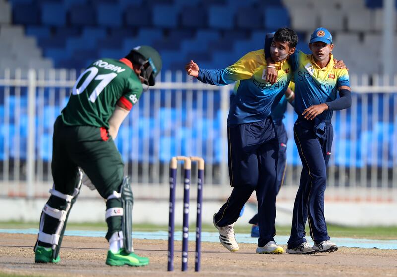 Sri Lanka's Treveen Mathew after taking the wicket of Bangladesh's Mahfijul Islam in Sharjah.