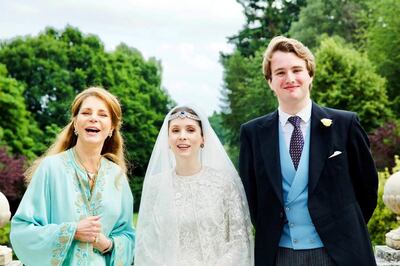 Queen Noor of Jordan, with her daughter Princess Raiyah and Ned Donovan on their wedding day. Arabian Royal Agency