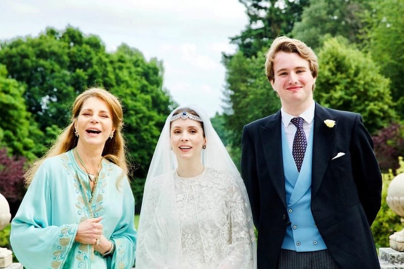 Queen Noor of Jordan, with her daughter Princess Raiyah and Ned Donovan on their wedding day. Arabian Royal Agency