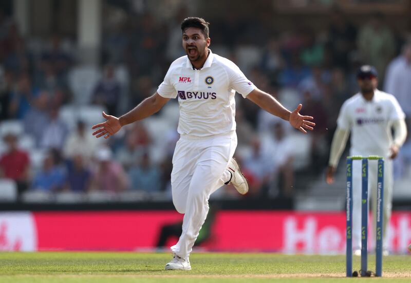 India's Shardul Thakur celebrates taking the wicket of Rory Burns for 50. Getty