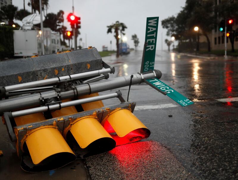 Traffic lights lie on a street after being knocked down, as Hurricane Harvey approaches in Corpus Christi, Texas. Adrees Latif / Reuters