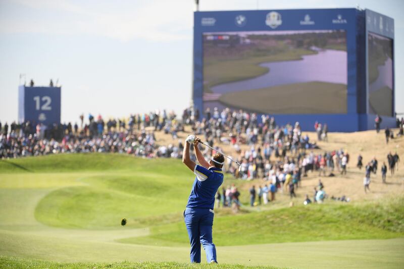Ian Poulter of Europe plays a shot on the 12th. Getty Images