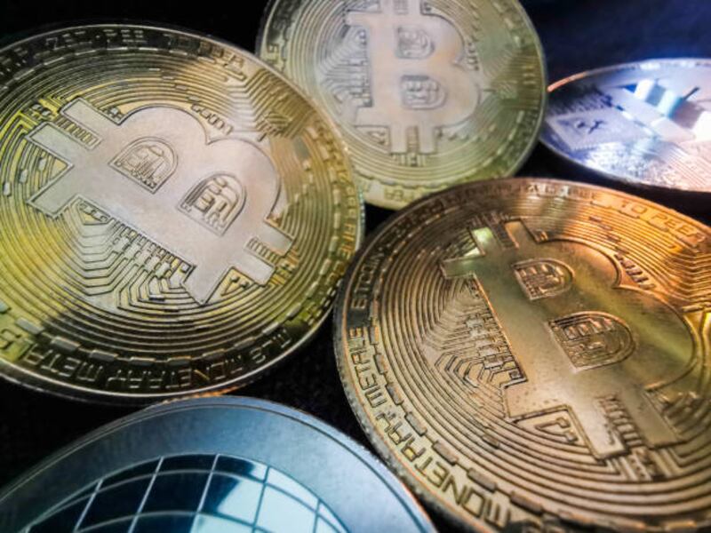 One way to gain exposure to digital tokens is to invest in publicly traded companies that have cryptocurrency holdings. Photo: Getty Images