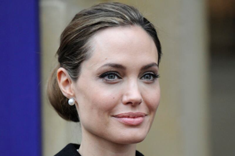 epa03699384 (FILE) A file picture dated 11 April 2013 shows US actress and humanitarian campaigner, Angelina Jolie, arriving to the G8 Foreign Ministers summit in London, Britain. According to media reports 14 May, Jolie has undergone a double mastectomy as a precaution against breast cancer.  EPA/FACUNDO ARRIZABALAGA
