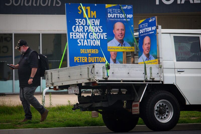 A campaign sign for 48-year-old former policeman and Home Affairs Minister Peter Dutton from the Liberal Party, outside his electorate office in the seat of Dickson on the northern outskirts of Brisbane. AFP