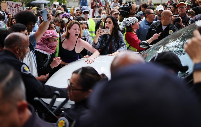 Pro-Palestine demonstrators argue with University of Southern California officials, who attempted to take down an encampment set up in support of Gaza, at the institution in Los Angeles. Getty images