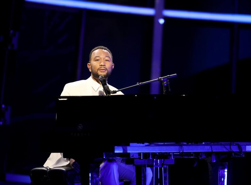 John Legend dedicates his performance to wife Chrissy Teigen, who recently had a miscarriage. Reuters