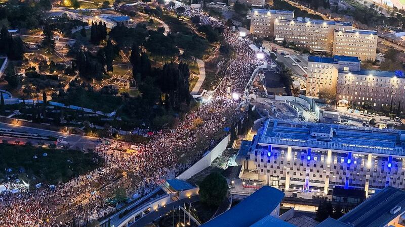 Thousands of protesters gather outside the Knesset in Jerusalem on Sunday demanding the resignation of Benjamin Netanyahu's government. Reuters