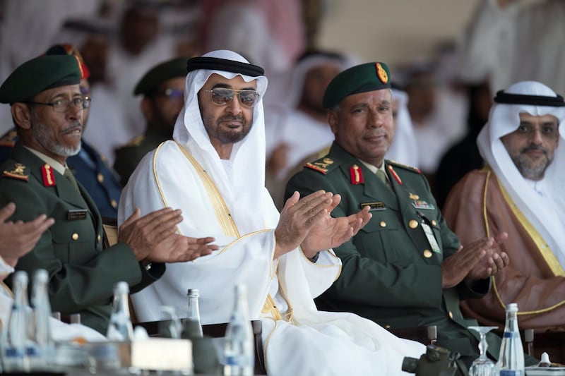 ZAYED MILITARY CITY, ABU DHABI, UNITED ARAB EMIRATES - November 28, 2017: HH Sheikh Mohamed bin Zayed Al Nahyan, Crown Prince of Abu Dhabi and Deputy Supreme Commander of the UAE Armed Forces (C), HE Lt General Hamad Thani Al Romaithi, Chief of Staff UAE Armed Forces (L), Brigadier Faisal Mohamed Al Shehhi (3rd L) and HH Sheikh Sultan bin Mohamed Al Qasimi, Crown Prince of Sharjah (R), attend the graduation ceremony of the 8th cohort of National Service recruits and the 6th cohort of National Service volunteers at Zayed Military City. 

( Hamad Al Mansouri for the Crown Prince Court - Abu Dhabi )
---