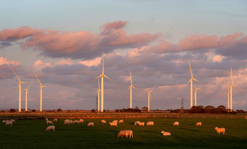 Some UK companies that operate wind and solar farms are already paying back excess profits to consumers. PA