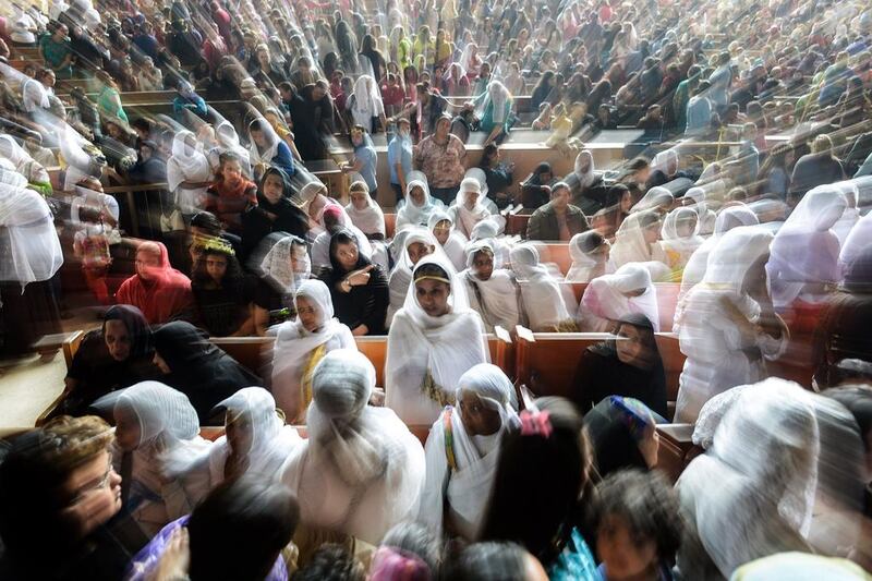 Orthodox Christians attend the Palm Sunday service in Cairo, Egypt. Mohamed El-Shahed / AFP