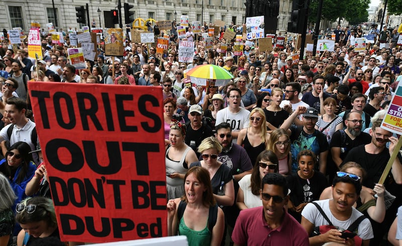 Demonstrators protesting on Downing Street in central London on June 17, 2017. Chris J Ratcliffe / AFP