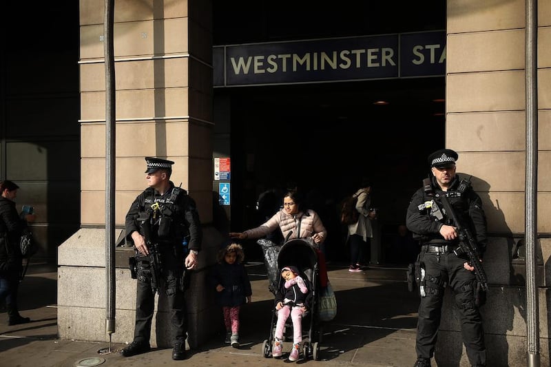 Armed British Transport Police stand outside Westminster Underground Station in London following a terror attack. Dan Kitwood / Getty Images