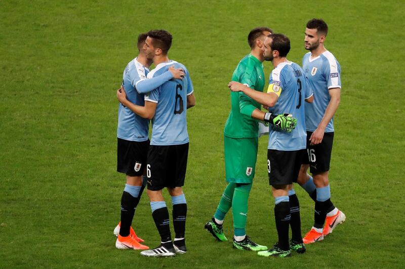 Uruguayan players greet each other after the Copa America 2019 Group C soccer match between Uruguay and Ecuador, at Mineirao Stadium in Bello Horizonte, Brazil. EPA