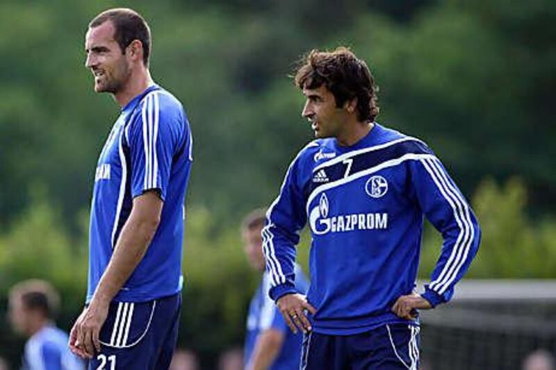Raul, right, stands beside new teammate Christoph Metzelder at his first training session in Gelsenkirchen yesterday.