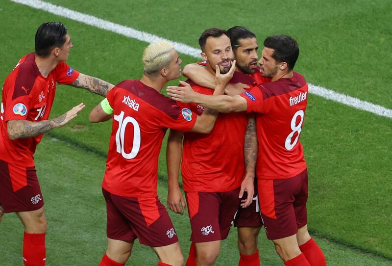June 20, Group A:  Switzerland 3-1 Turkey. Reuters
