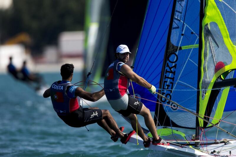 Jorge Lima and Jose Costa of Portugal compete in the men’s skiff 49er fleet race during the ISAF Sailing World Cup Finals at the Breakwater in Abu Dhabi on November 27, 2014. Christopher Pike / The National