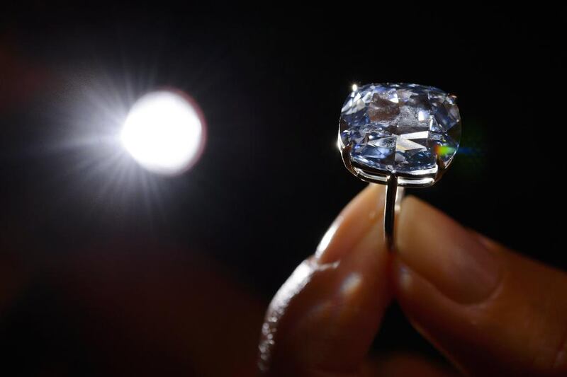 Hong Kong property tycoon Joseph Lau paid US$48.4 million at a Sotheby’s auction for this 12.03-carat blue diamond in November 2015. Fabrice Coffrini / AFP