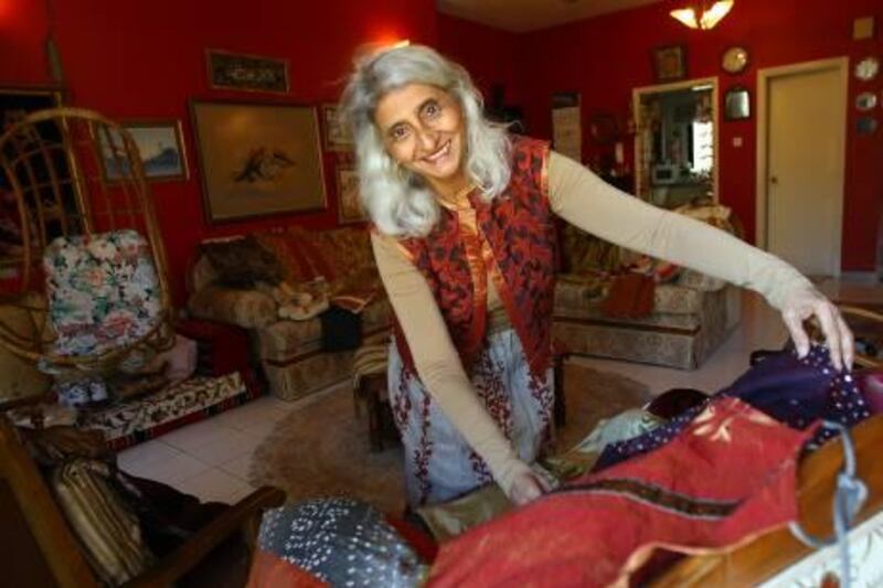 Dubai,  United Arab Emirates- November 15,  2011:  Tasleem Karmali, who collects leftover material  used by tailors and sews these into clothes and sold at charity functions pose during the interview at her residence in Dubai  . (  Satish Kumar / The National )