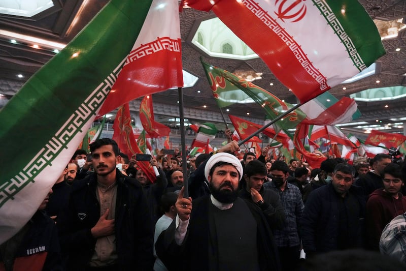 An Iranian ceremony marking the anniversary of the death of IRGC commander Gen Qassem Suleimani . AP