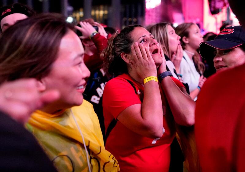 Toronto Raptors fans hang their heads following their team's 106-105 loss during a street party in Jurassic Park, outside of Scotiabank Arena in Toronto, Ontario. AFP