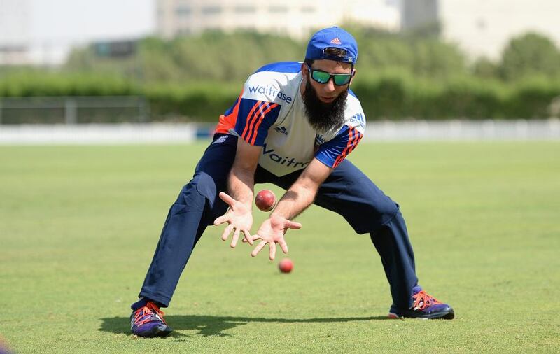 Moeen Ali of England catches during a nets session at ICC Cricket Academy on October 2, 2015 in Dubai.  (Photo by Gareth Copley/Getty Images)