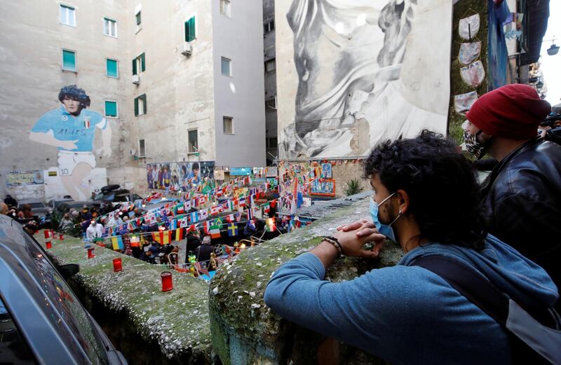 People gather in Naples to mourn the death of Diego Maradona. Reuters