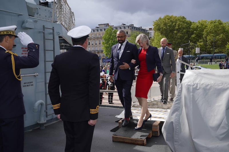 Mr Cleverly and his wife Susie arrive on the Royal Navy Frigate HMS Iron Duke in Bordeaux, France, in September. Getty Images