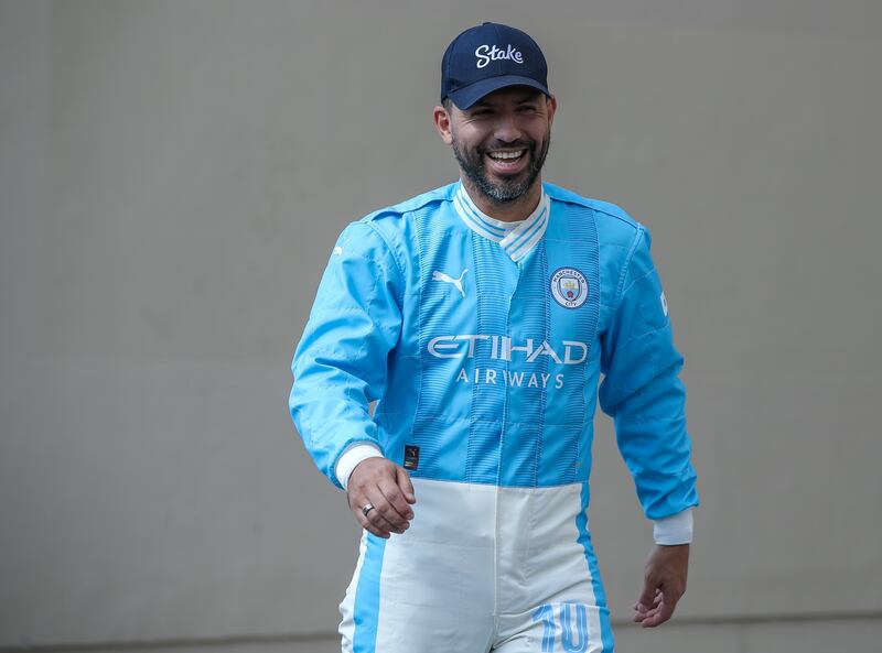 Sergio Aguero arrives for qualifying day at the Abu Dhabi GP on Saturday.