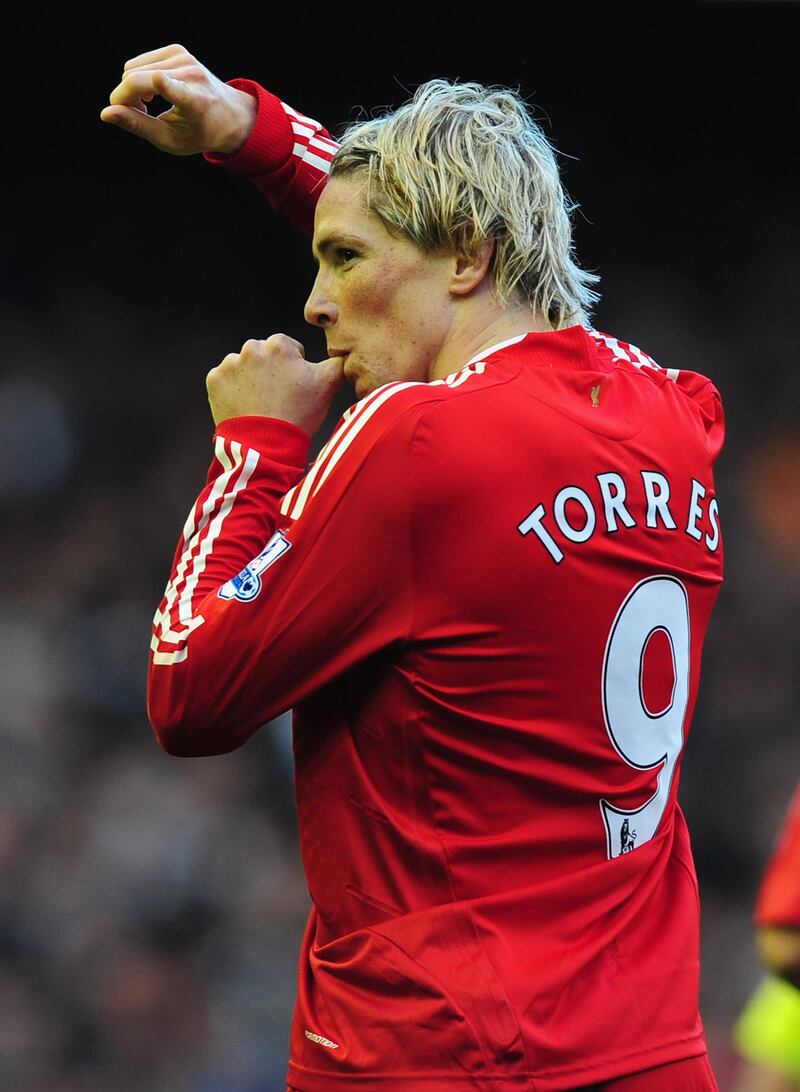 LIVERPOOL, ENGLAND - OCTOBER 25:  Fernando Torres of Liverpool celebrates scoring the opening goal during the Barclays Premier League match between Liverpool and Manchester United at Anfield on October 25, 2009 in Liverpool, England.  (Photo by Clive Mason/Getty Images)