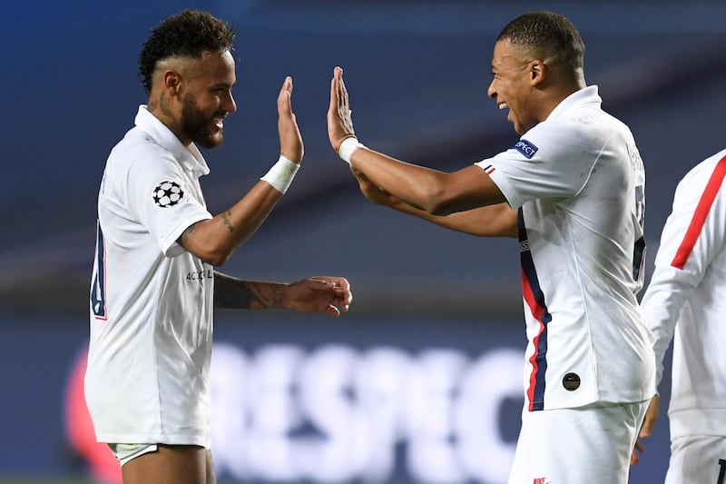 PSG's Neymar, left, celebrates with teammate PSG's Kylian Mbappe after the win. AP