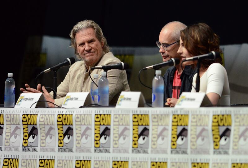 Jeff Bridges, left, Sergey Bodrov, center, and Antje Traue attend the "Seventh Son" panel on Day 4 of Comic-Con International on Saturday, July 20, 2013 in San Diego. (Photo by Jordan Strauss/Invision/AP) *** Local Caption ***  2013 Comic-Con - Seventh Son Panel.JPEG-072a8.jpg