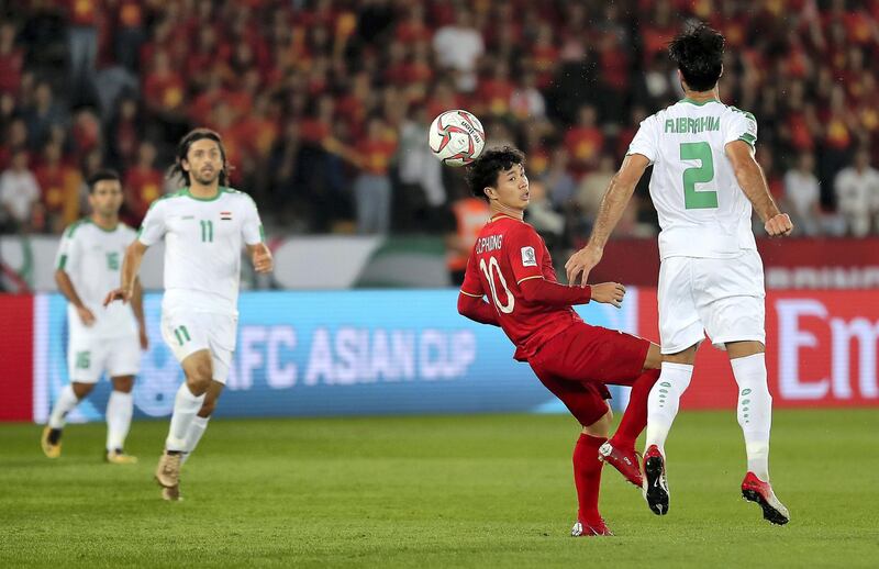 ABU DHABI , UNITED ARAB EMIRATES , January 8 ��� 2019 :- Nguyen Cong Phuong ( no 10 in red ) of Vietnam in action during the AFC Asian Cup UAE 2019 football match between IRAQ vs. VIETNAM held at Zayed Sports City in Abu Dhabi. Iraq won the match by 3-2. ( Pawan Singh / The National ) For News/Sports