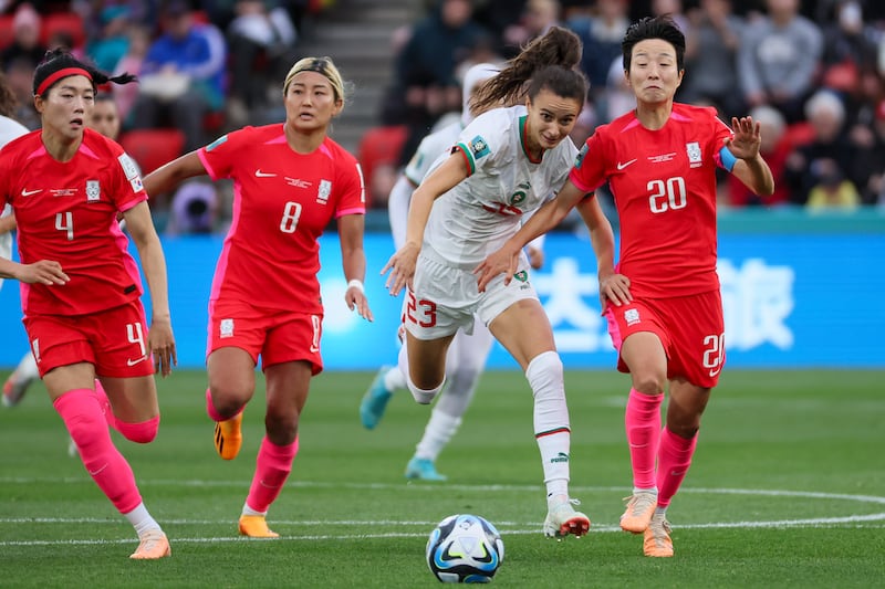 Morocco's Rosella Ayane, second right, competes for the ball with South Korea's Shim Seo-yeon , left, Cho So-hyun, and Kim Hye-ri, right. AP 