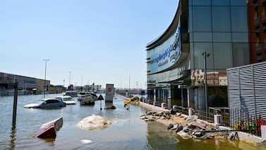 Cars stranded on flooded streets in Dubai. AFP