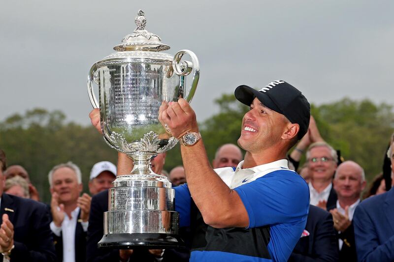 FILE PHOTO: May 19, 2019; Bethpage, NY, USA; Brooks Koepka celebrates with the Wanamaker trophy after winning the PGA Championship golf tournament at Bethpage State Park - Black Course. Mandatory Credit: Peter Casey-USA TODAY Sports/File Photo