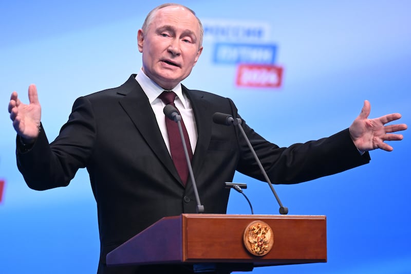 Incumbent Vladimir Putin at his campaign headquarters in Moscow, after claiming a landslide victory in an election the West has called a sham. EPA