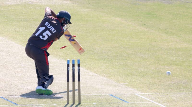 Chirag Suri of UAE is bowled by Mark Adair.