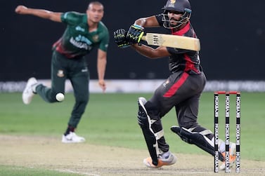 UAE's CP Rizwan bats during the T20 international between the UAE and Bangladesh. Sports City, Dubai. Chris Whiteoak / The National
