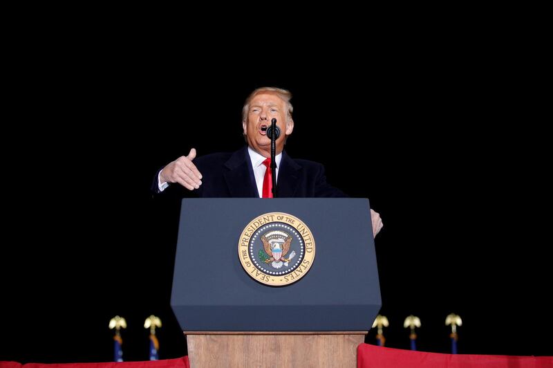 U.S. President Donald Trump gestures as he speaks during a campaign event at the Central Wisconsin Airport in Mosinee, Wisconsin, U.S., September 17, 2020. REUTERS/Tom Brenner