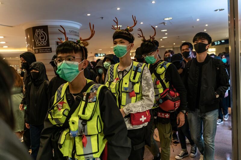 Volunteer medics are seen during a demonstration inside a shopping mall on December 24, 2019 in Hong Kong, China. Anthony Kwan/Getty Images