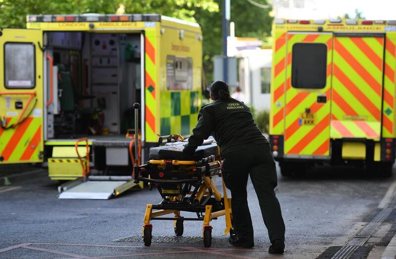 Ambulance staff at an NHS hospital in London on May 12, 2017, when hospitals across were hit by a large-scale ransomware cyberattack causing failures to computer systems. Andty Rain / EPA